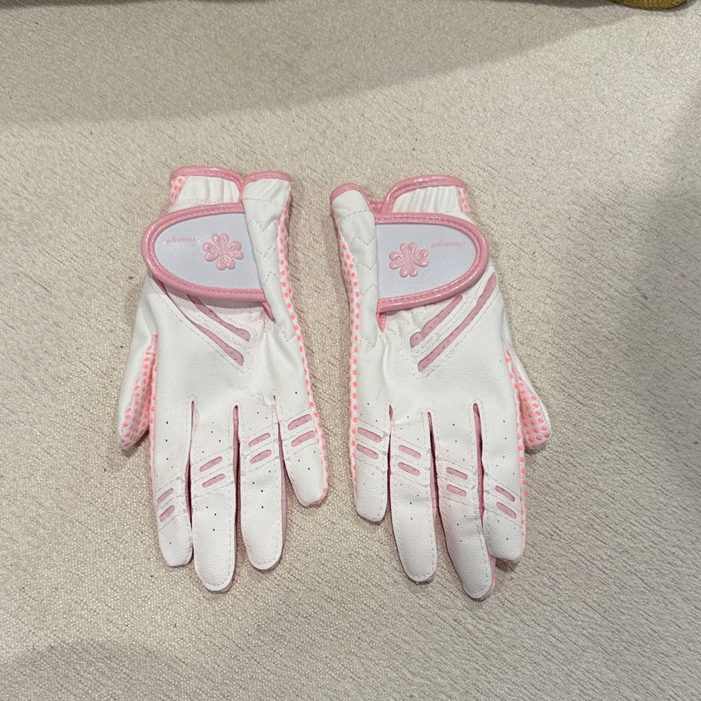White and Pink Golf Gloves